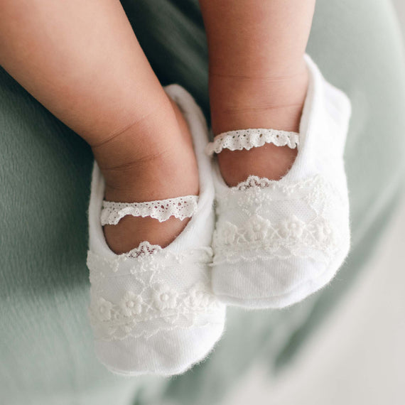 Close-up of a baby's feet wearing the boutique Ella Booties.