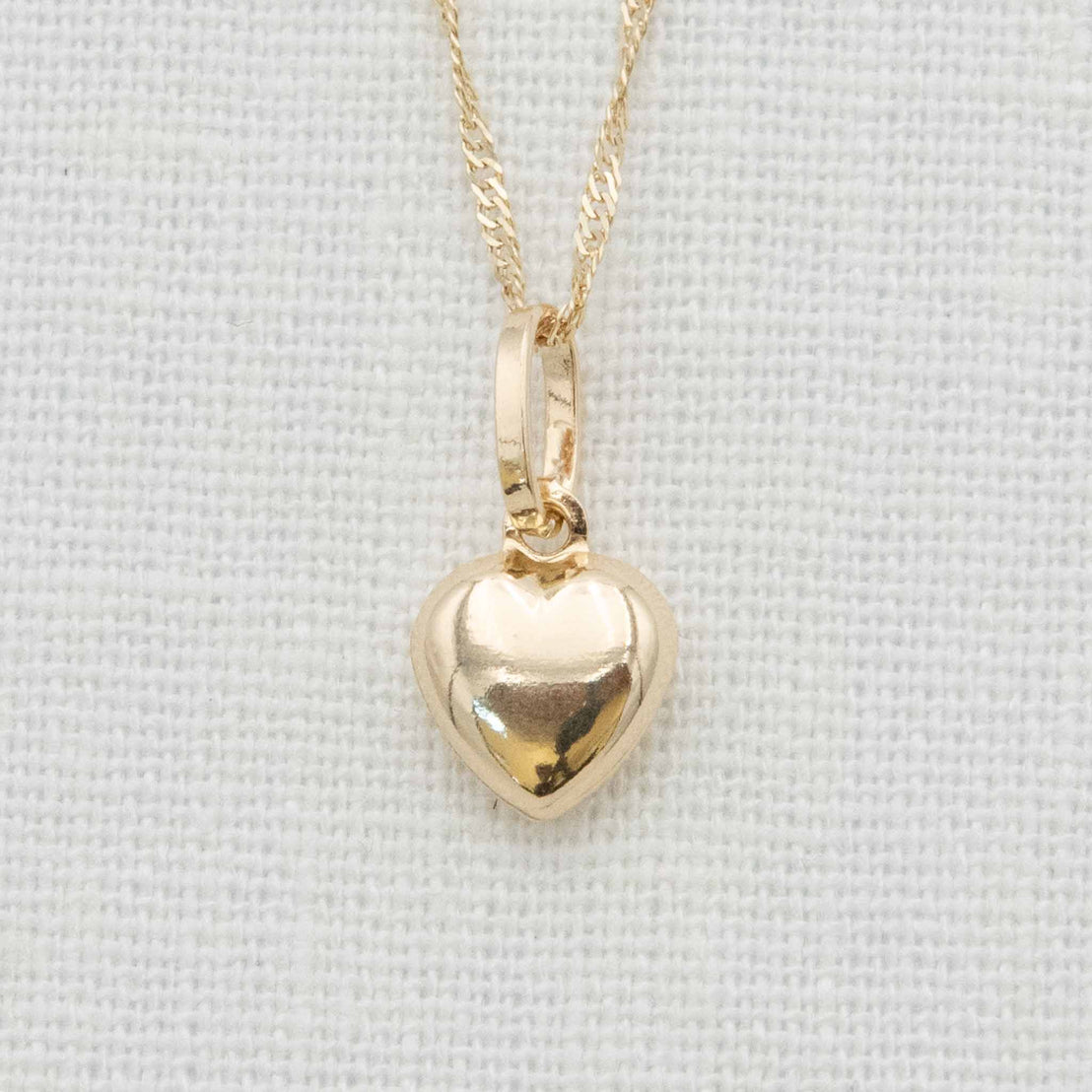 Large gold heart charm necklace