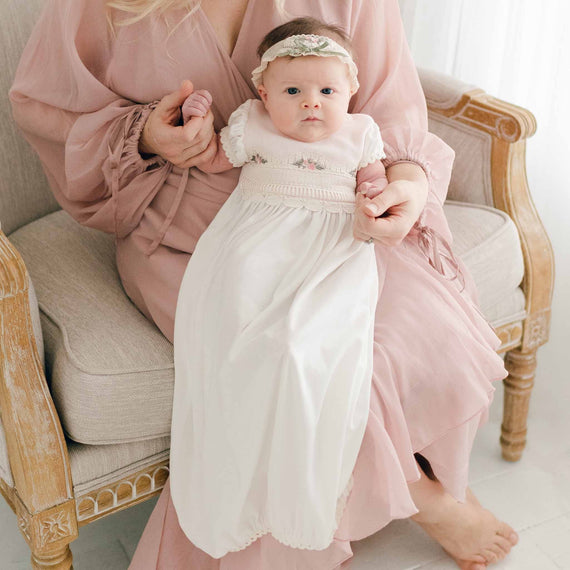 Mother holding her daughter who is wearing the Natalie Layette and Headband