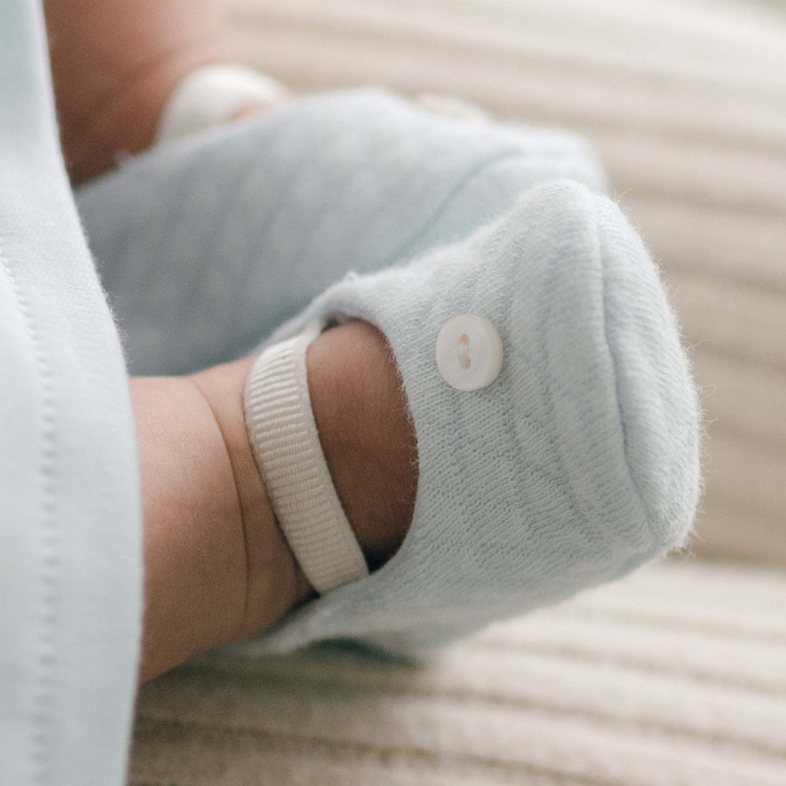 Close up of blue baby bootie shoe