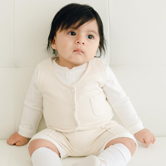 Baby boy wearing the Braden Vest Shorts Suit  made of ivory French Terry