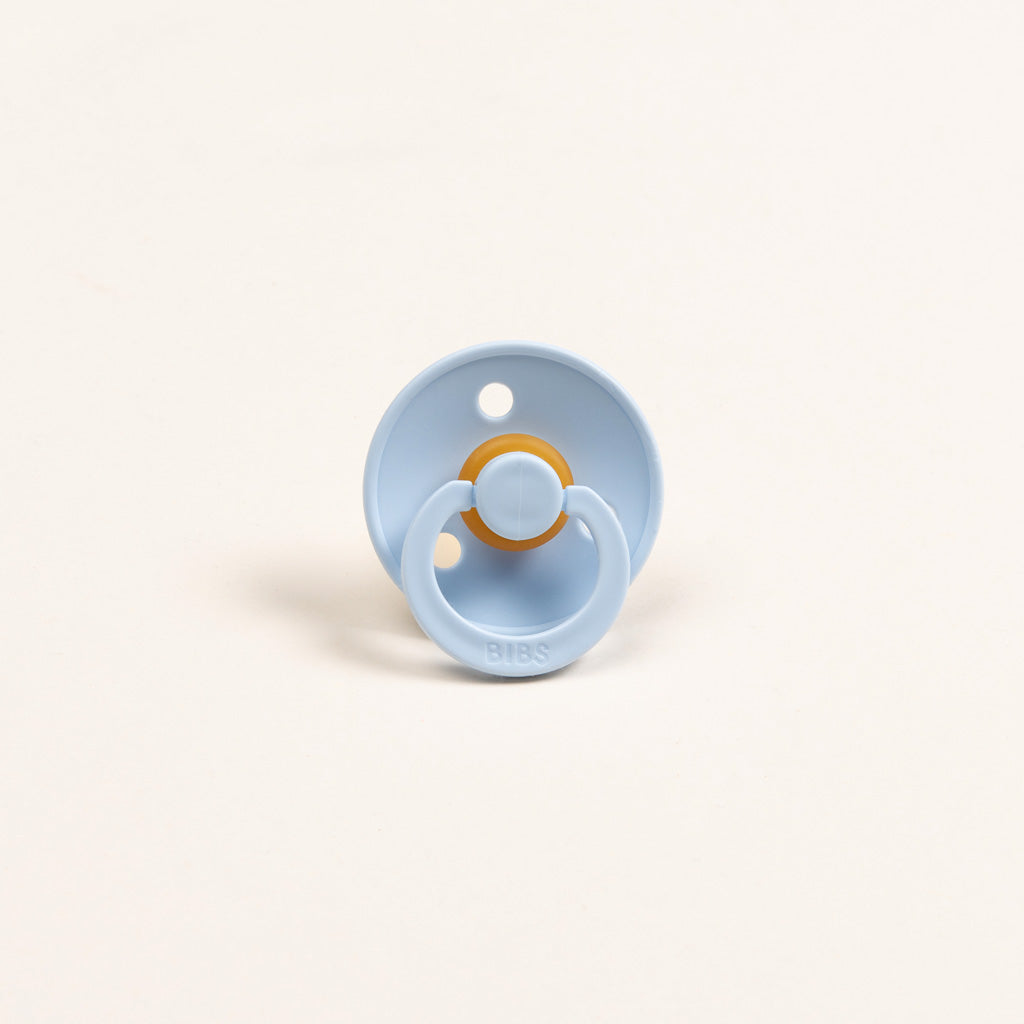 Photo of a baby blue colored pacifier