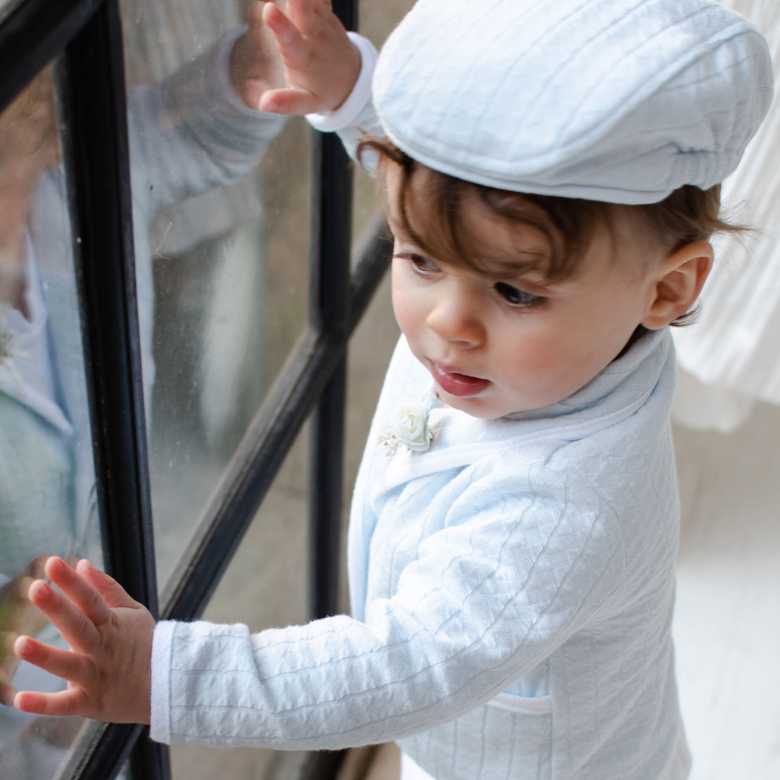 Detail of the Logan Jacket worn by a baby boy.